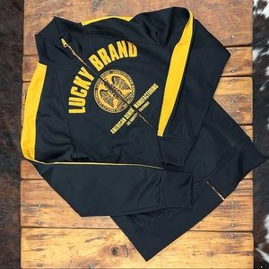 Lucky track jacket, black and gold EUC